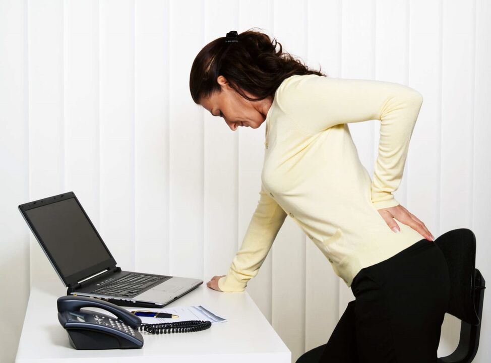 Dolor de espalda en la región lumbar foto 3